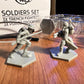 Trench fighter and purge trooper miniatures facing off