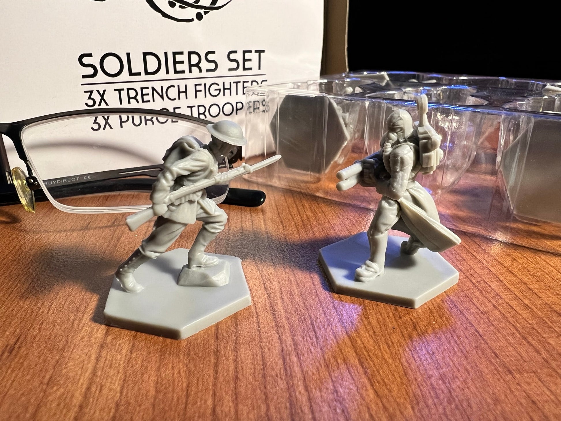 Trench fighter and purge trooper miniatures facing off
